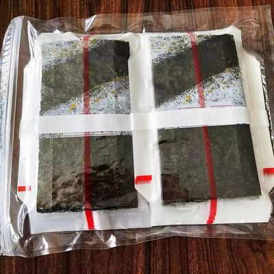 Triângulo Onigiri Nori com algas marinhas cozidas Triângulo Laver Alga em embalagens de plástico