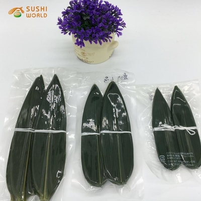 Faça bolinhos de arroz deliciosos com folhas frescas de bambu embaladas a vácuo